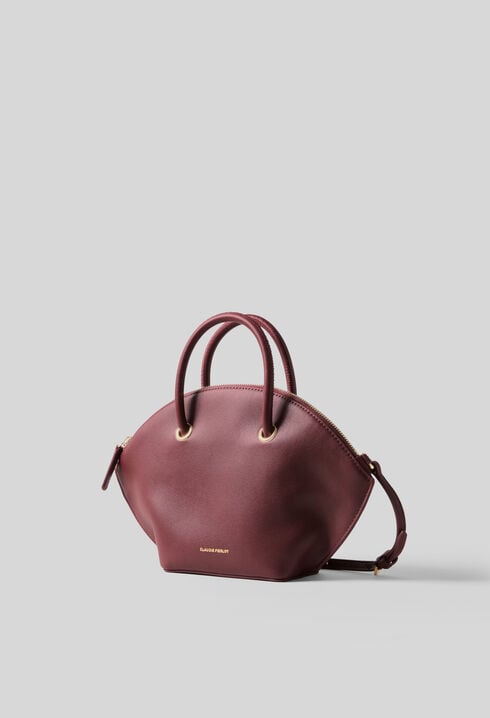 Smooth leather bag with gold rings