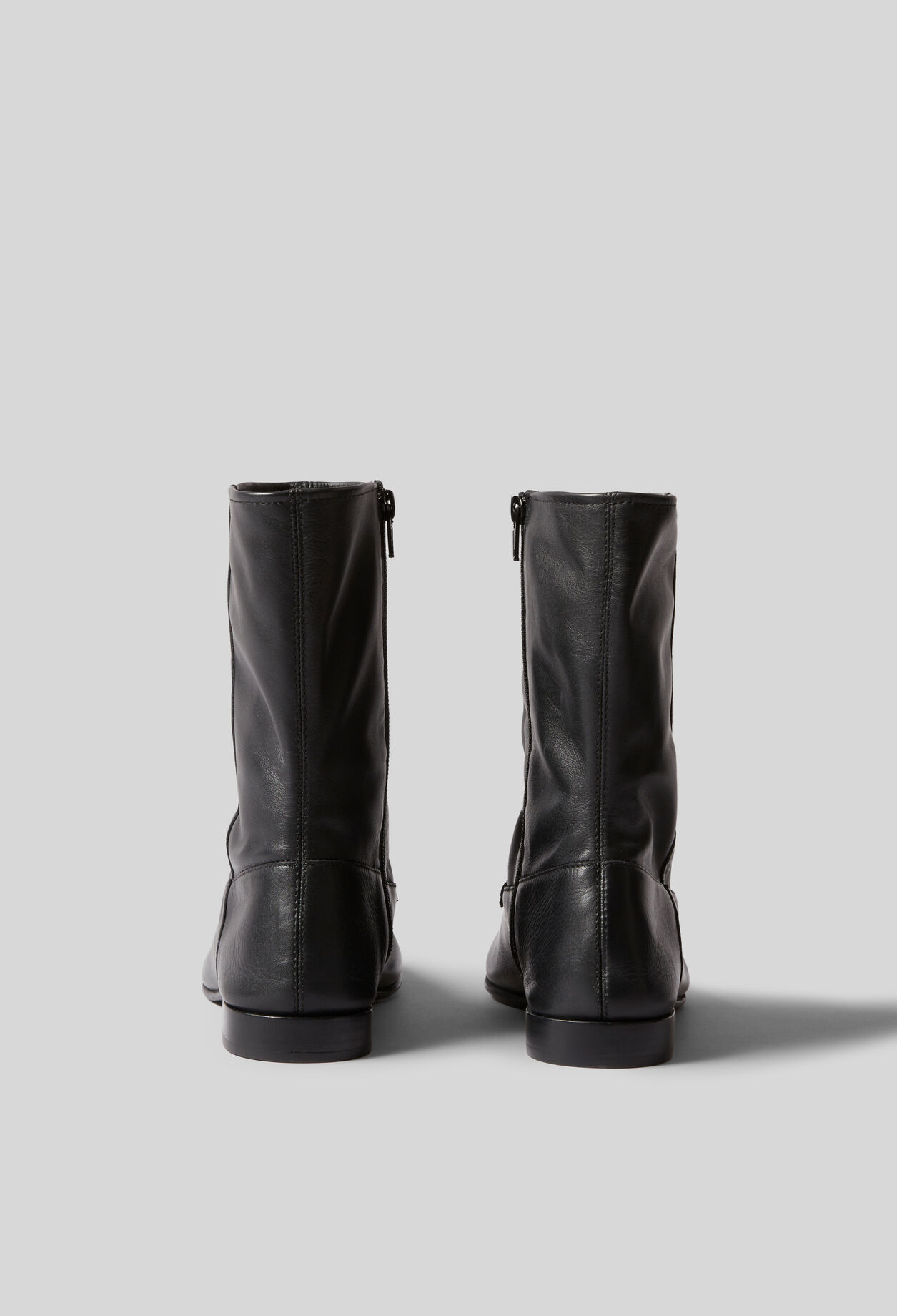 Leather Moccasin-Style Ankle Boots for women | Claudie Pierlot