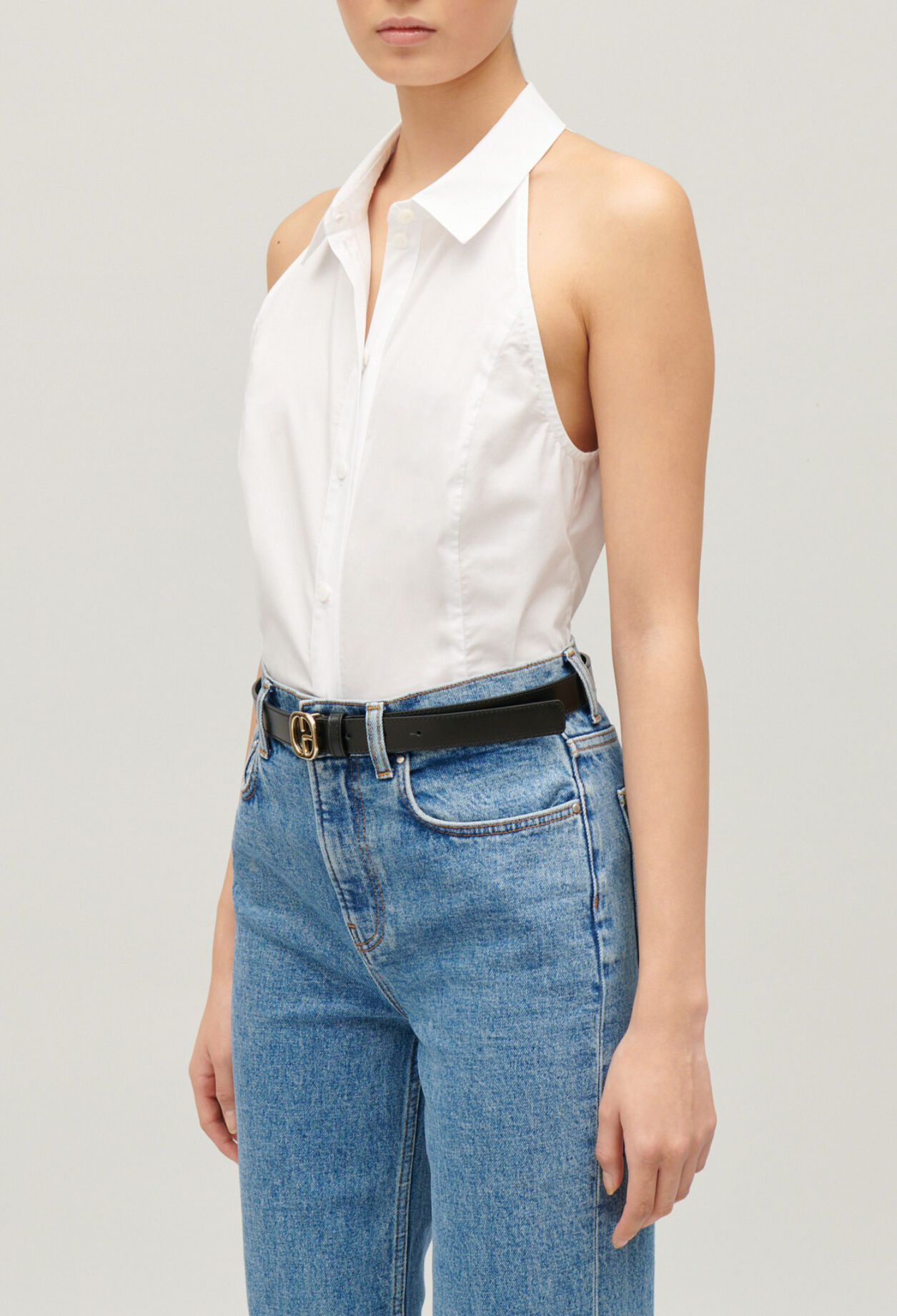 Sleeveless white shirt