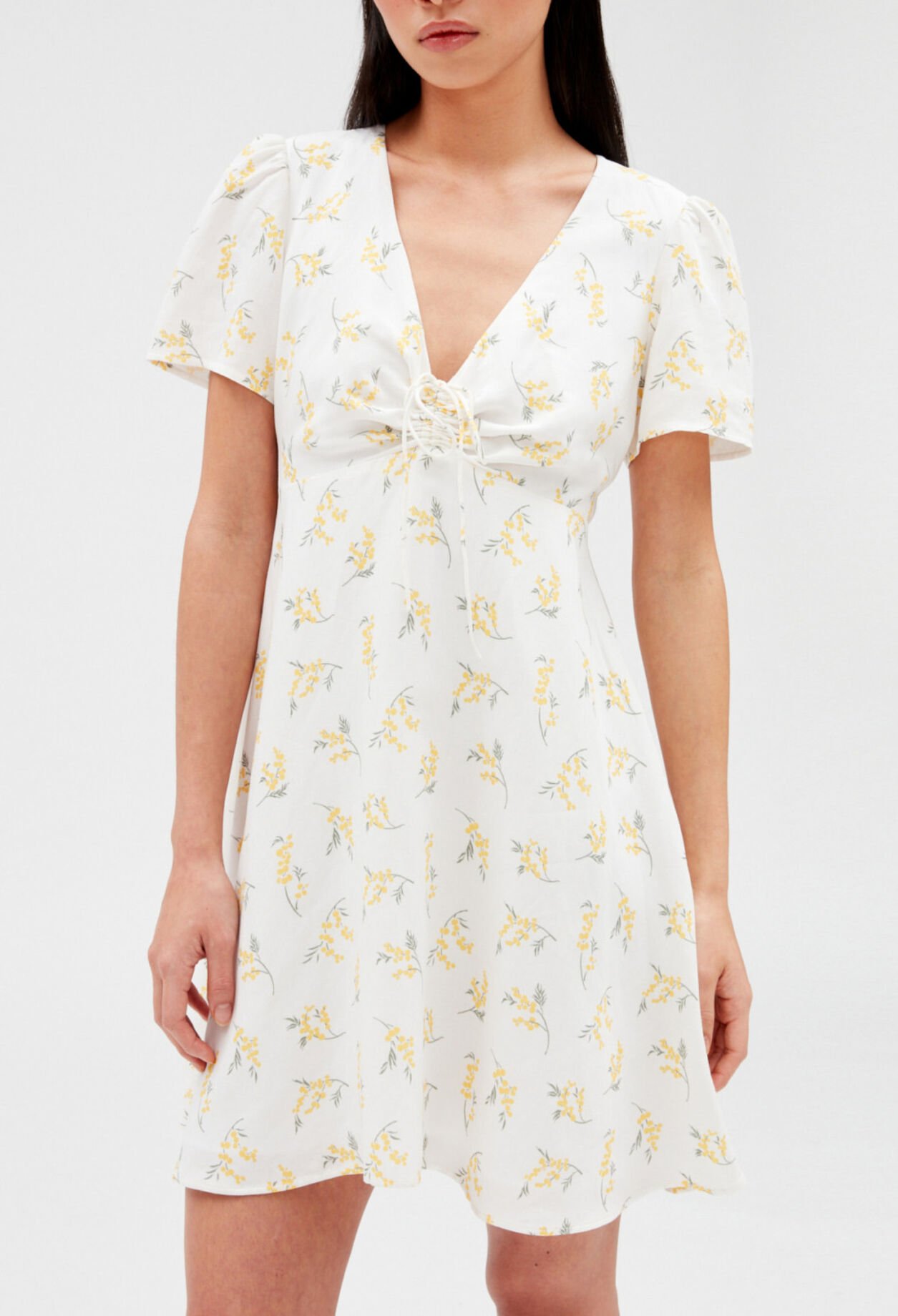 Short flared dress with mimosa pattern