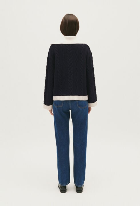 Navy blue cable-knit jumper