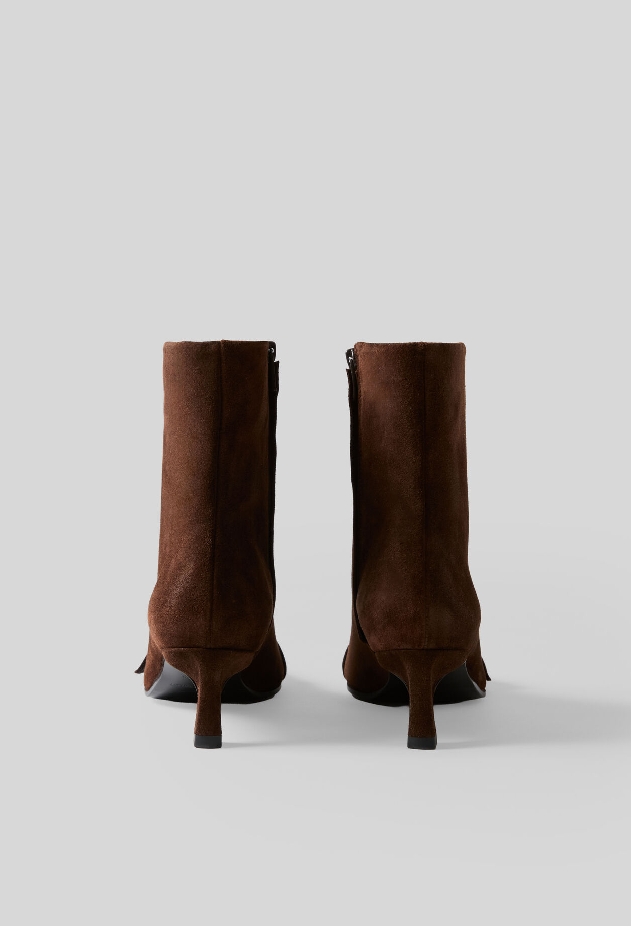 Suede ankle boots with gold buckle