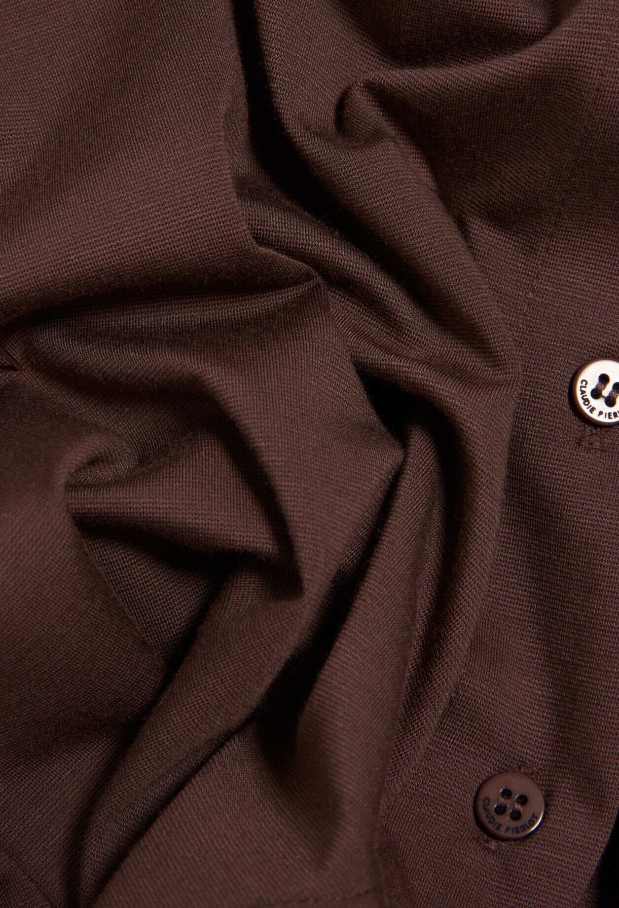 Black asymmetric button-up top