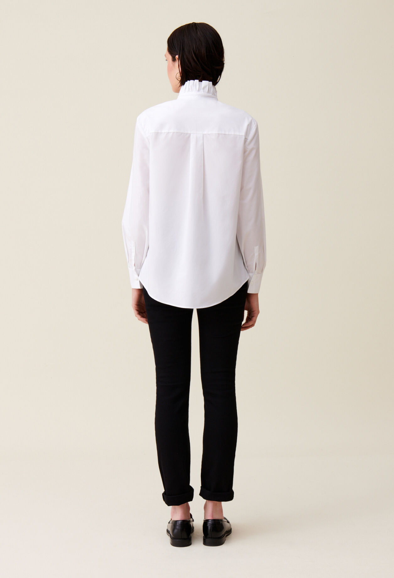 White shirt with ruffled collar