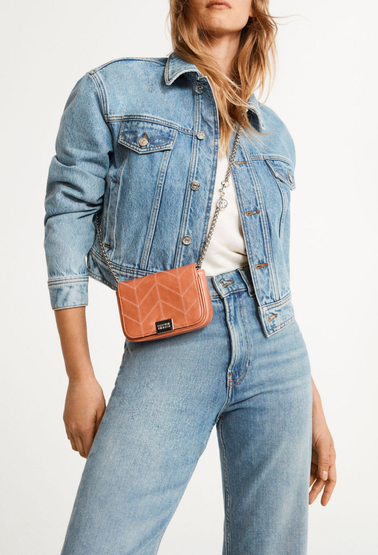 White patent leather clutch bag