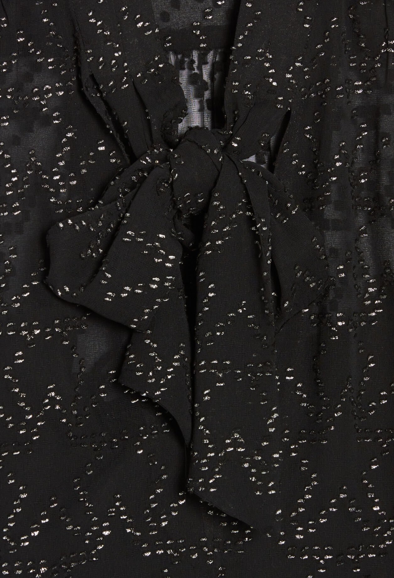 Star pattern shirt with pussycat bow