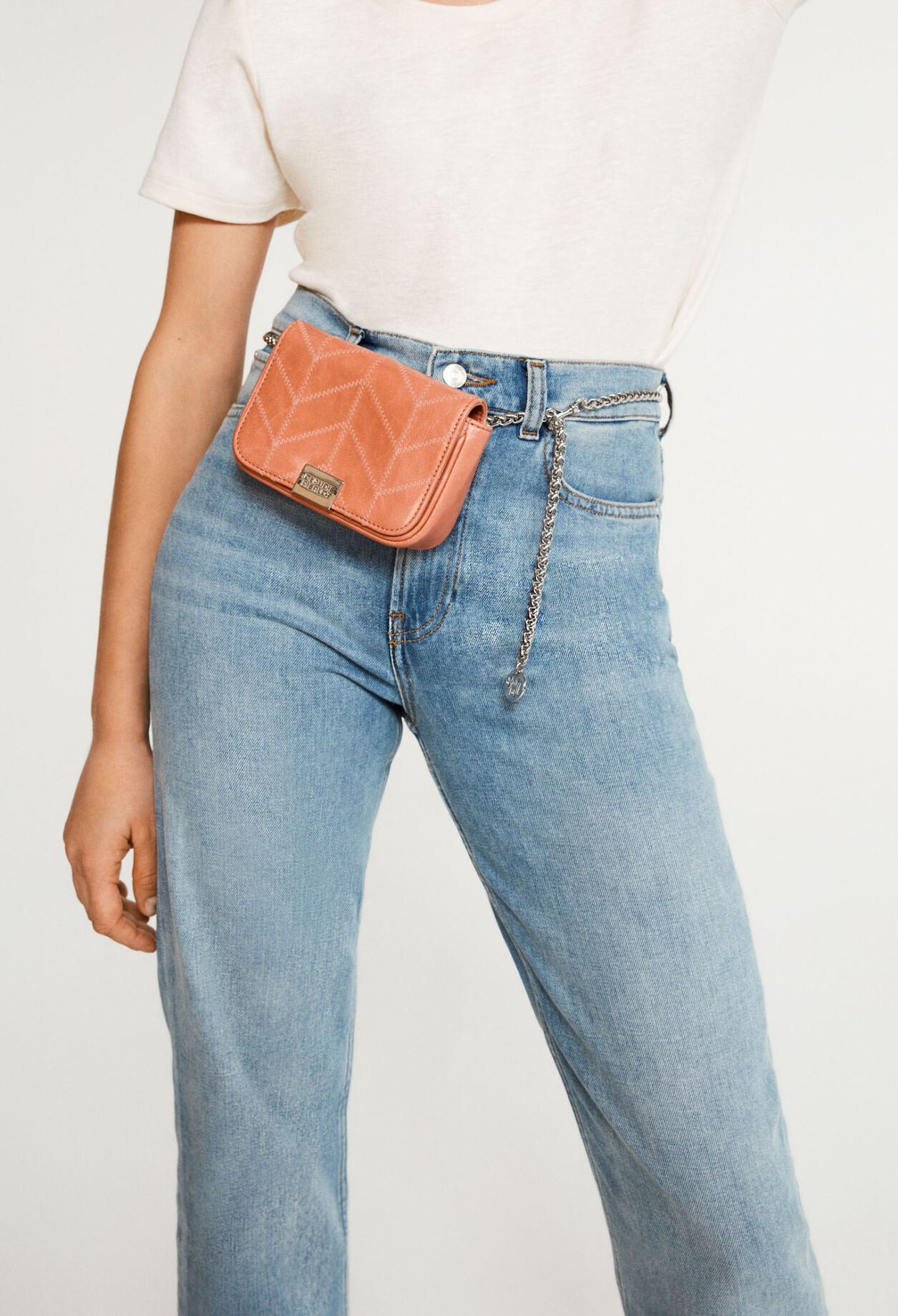 White patent leather clutch bag