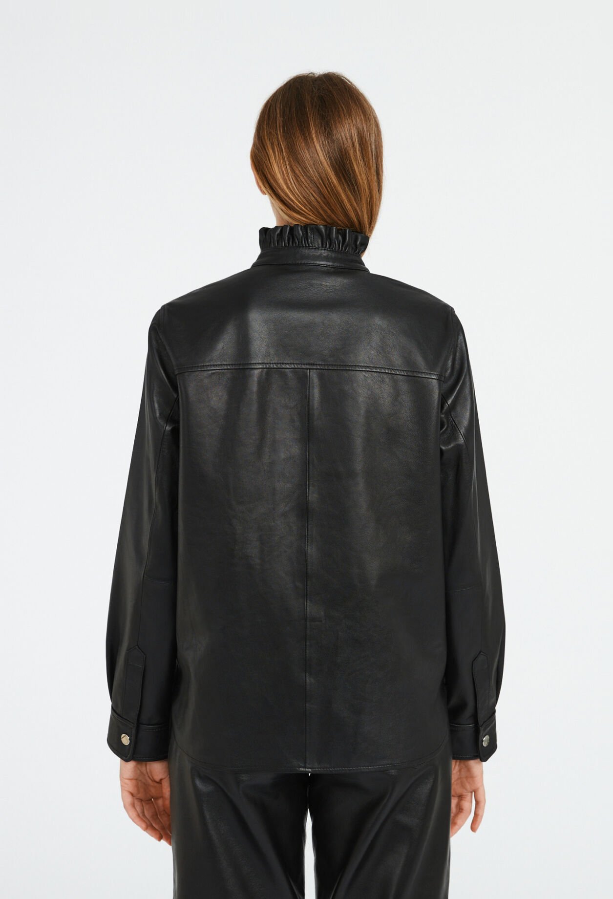 Leather shirt with ruffled collar
