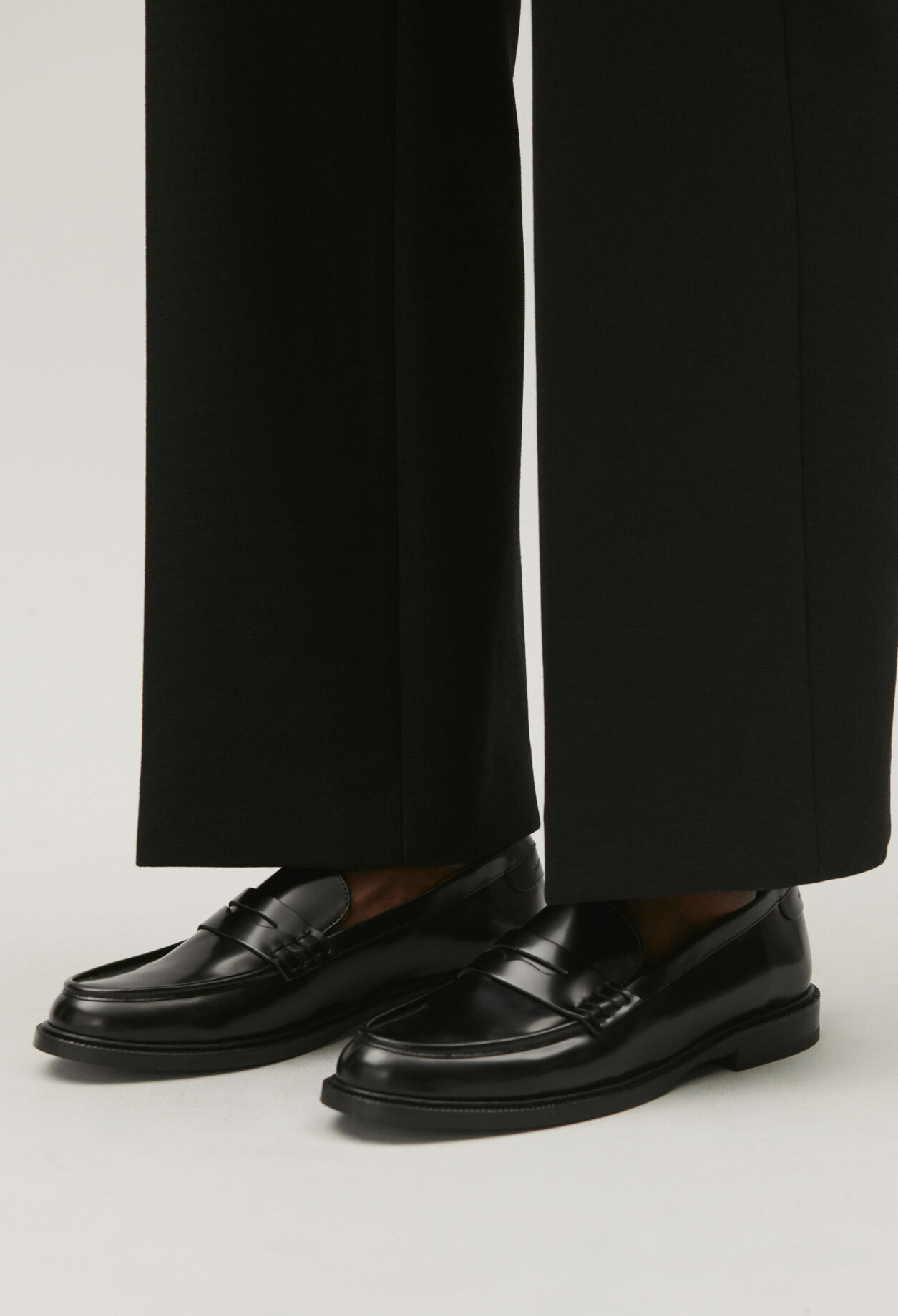 Black leather loafers