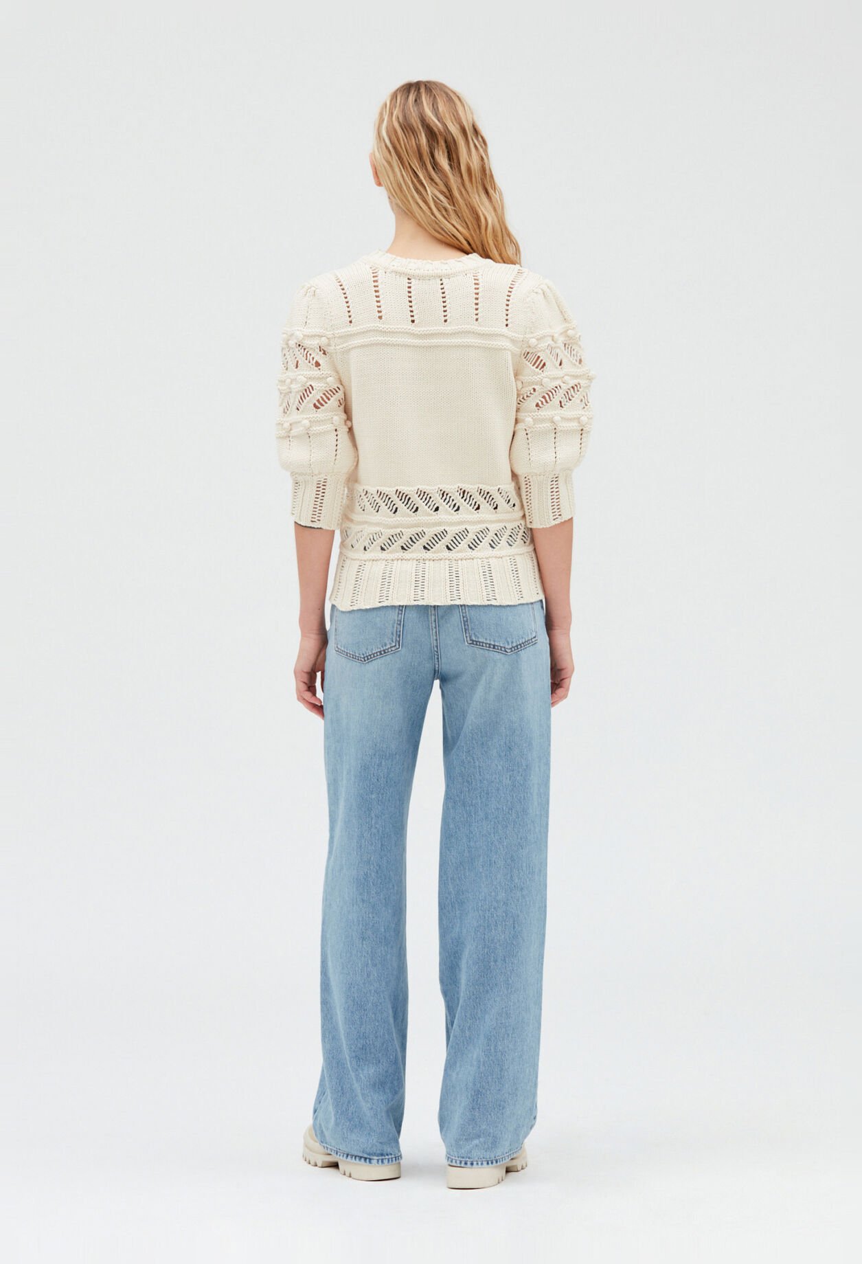 Knitted jumper with mimosa motifs