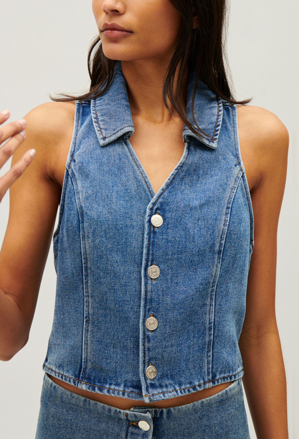 Blue denim sleeveless top
