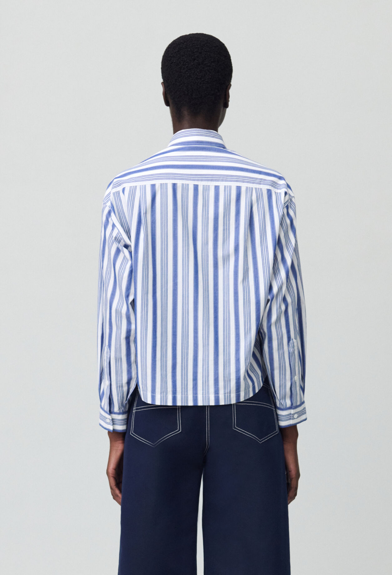 Striped shirt with bow collar