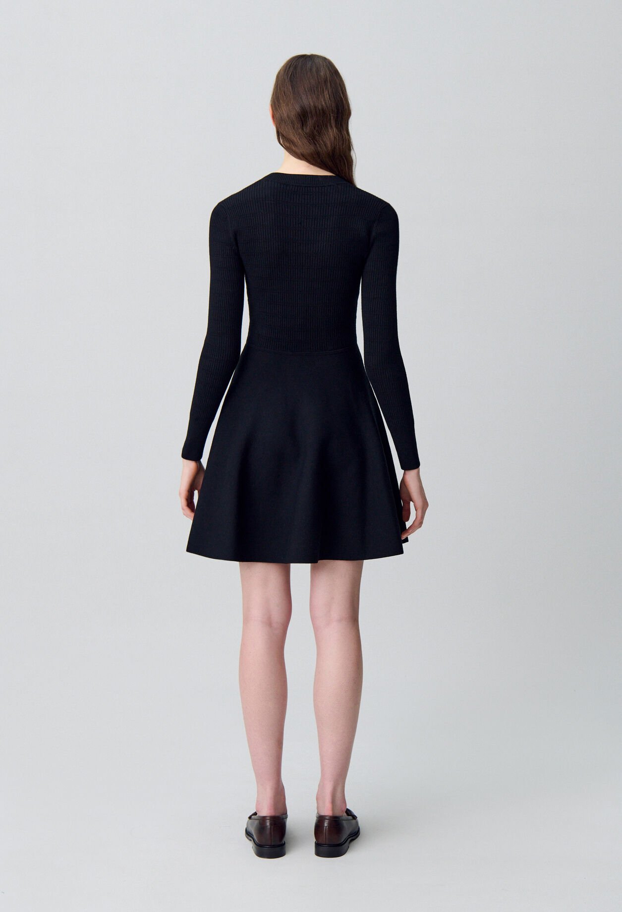 Short knitted dress with knots