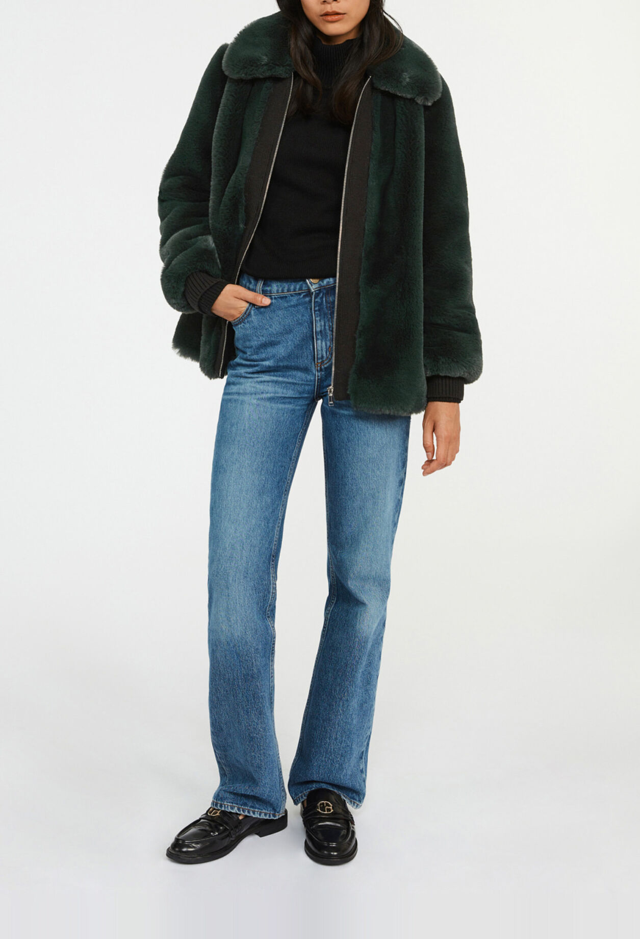 Manteau court fausse fourrure
