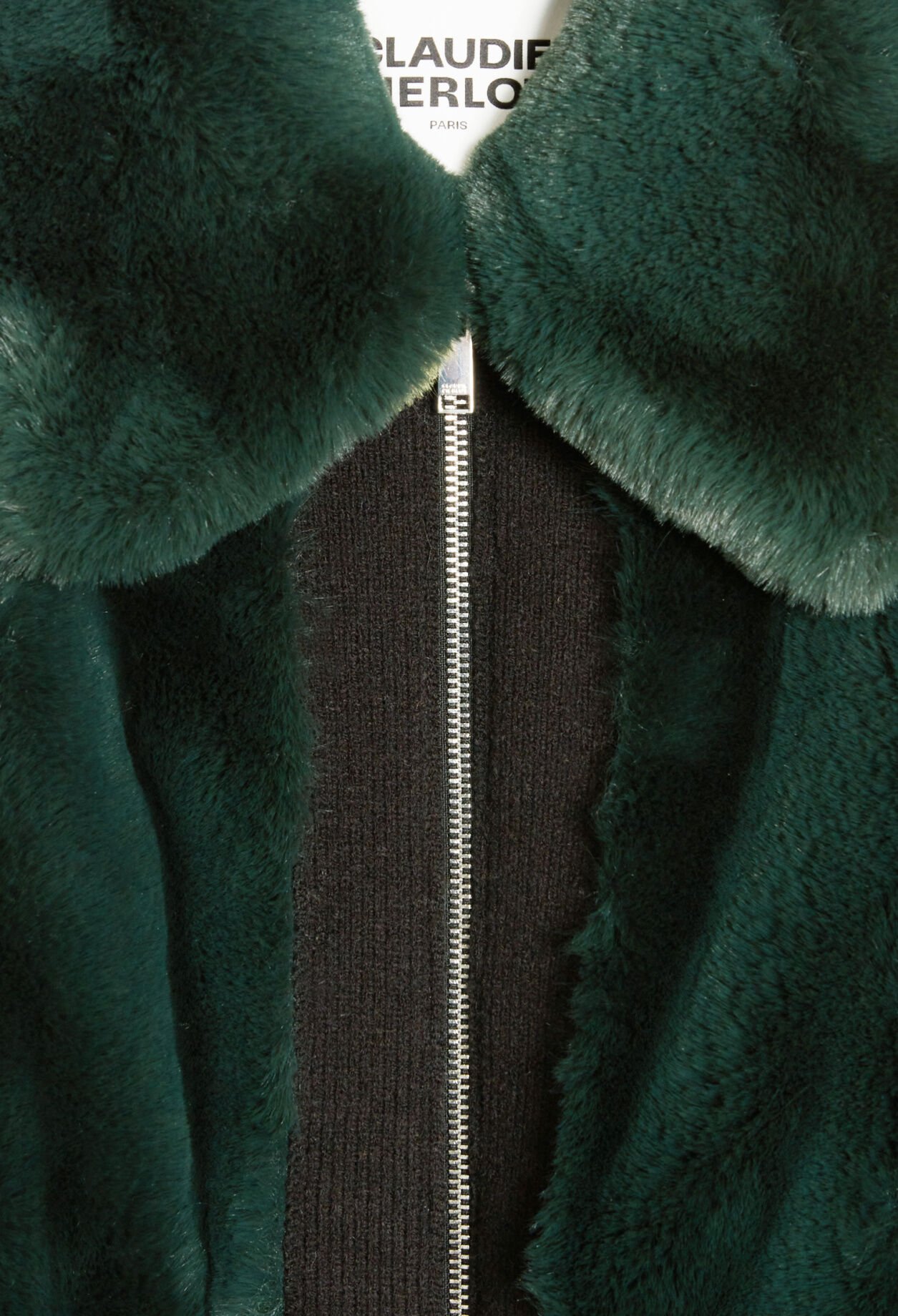 Manteau court fausse fourrure