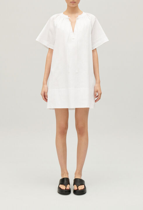 Short white lace-up dress