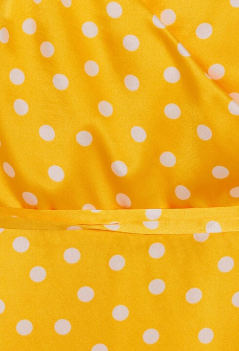 Long yellow silk wraparound dress.
