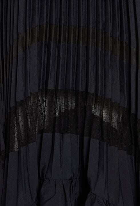 Pleated dress with frill