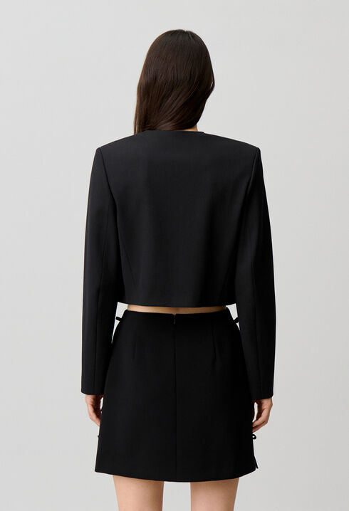 Short jacket with jewel buttons