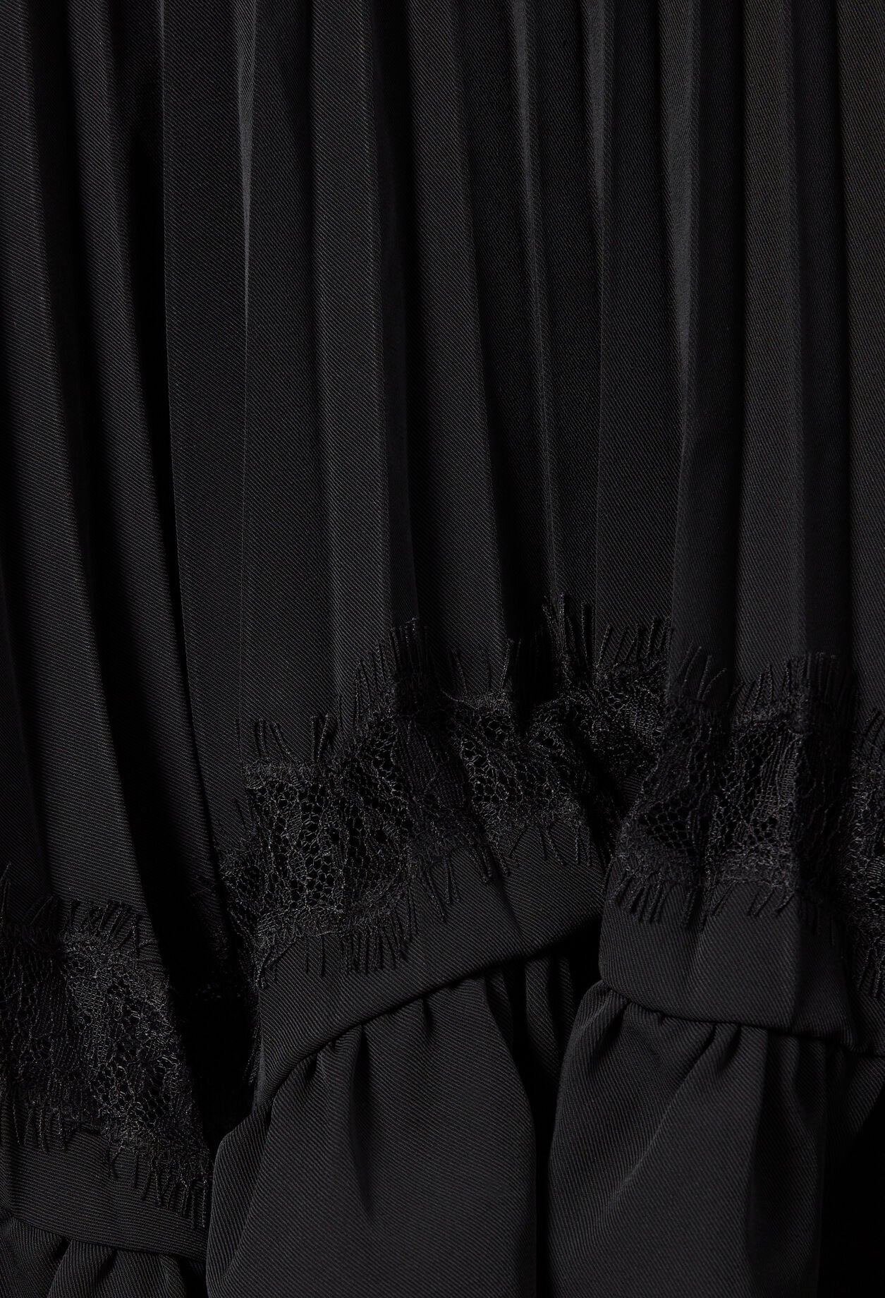 Asymmetric lace skirt