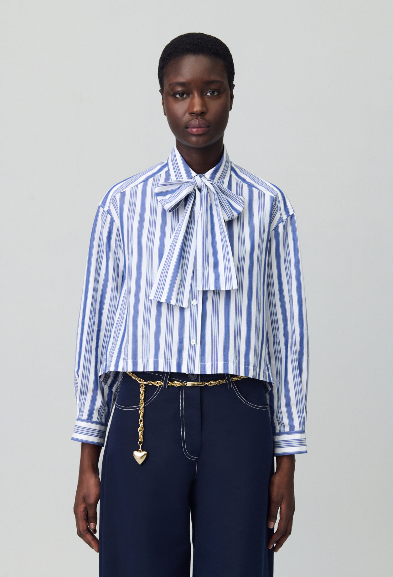 Striped shirt with bow collar