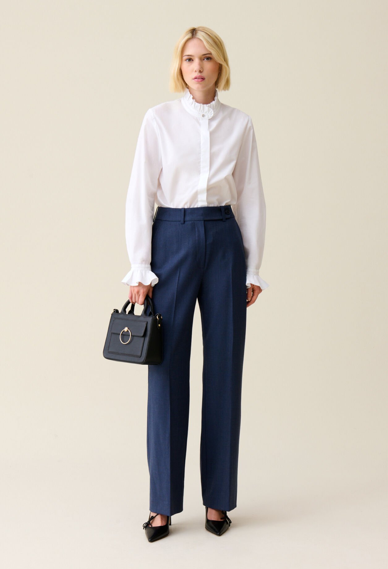 White shirt with ruffled collar