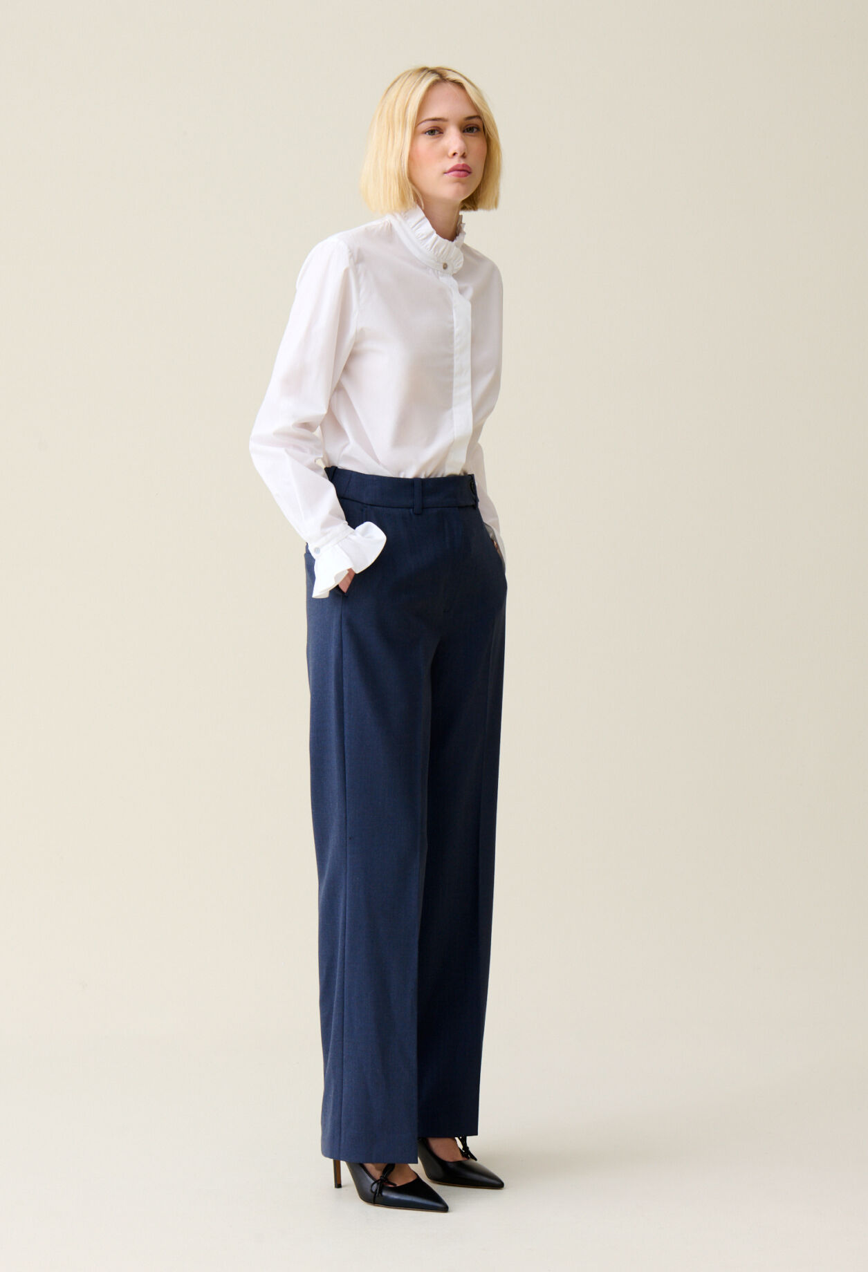 White shirt with ruffled collar