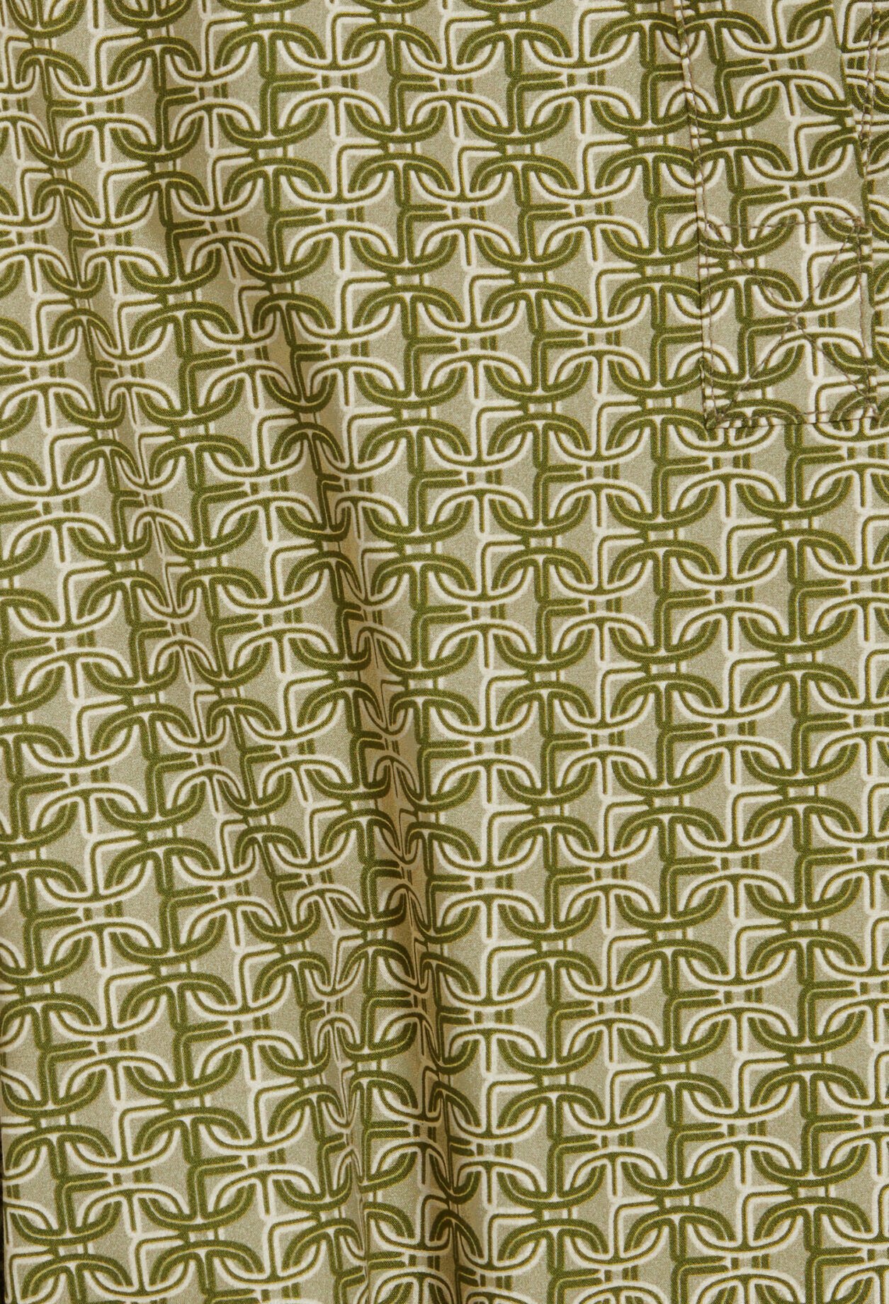 Short green monogram dress