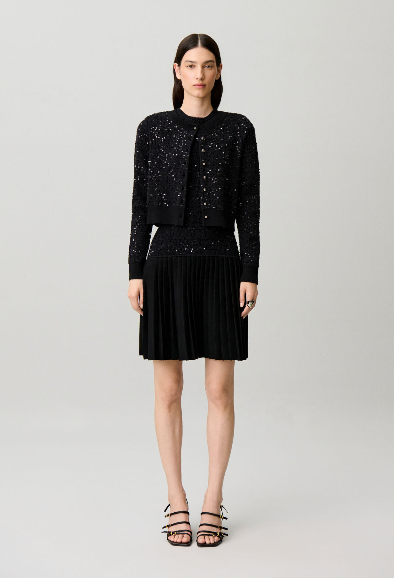 Short fitted sequinned knit dress