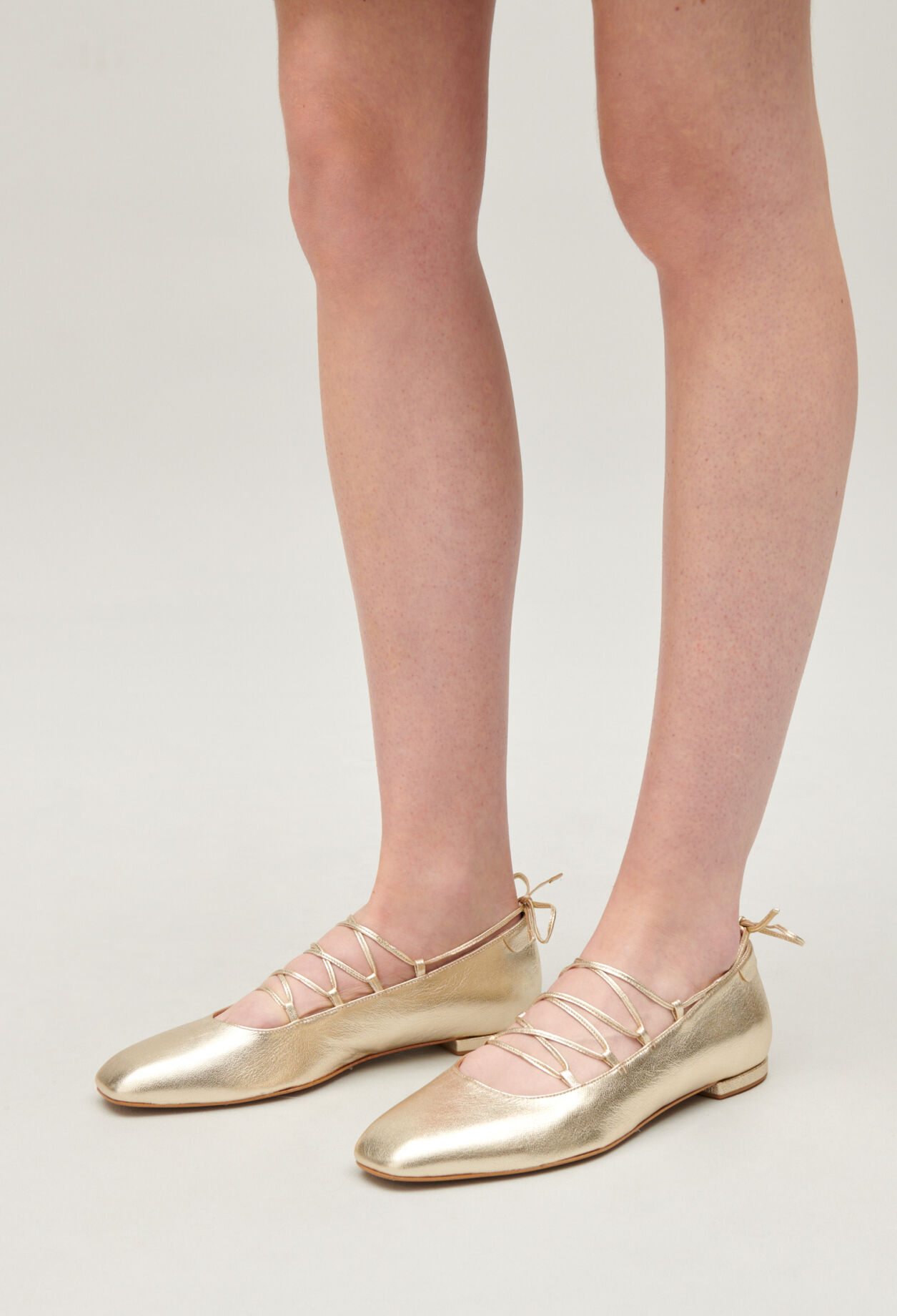 Gold ballet pumps leather discount