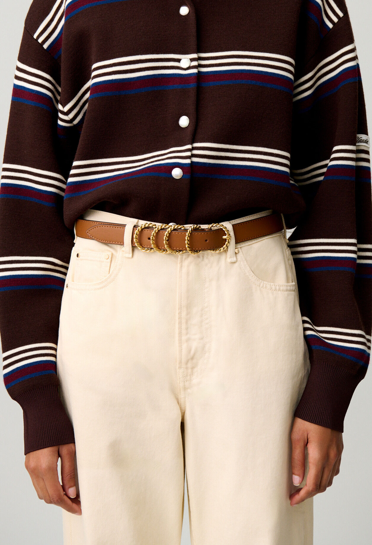 Leather belt with gold buckle